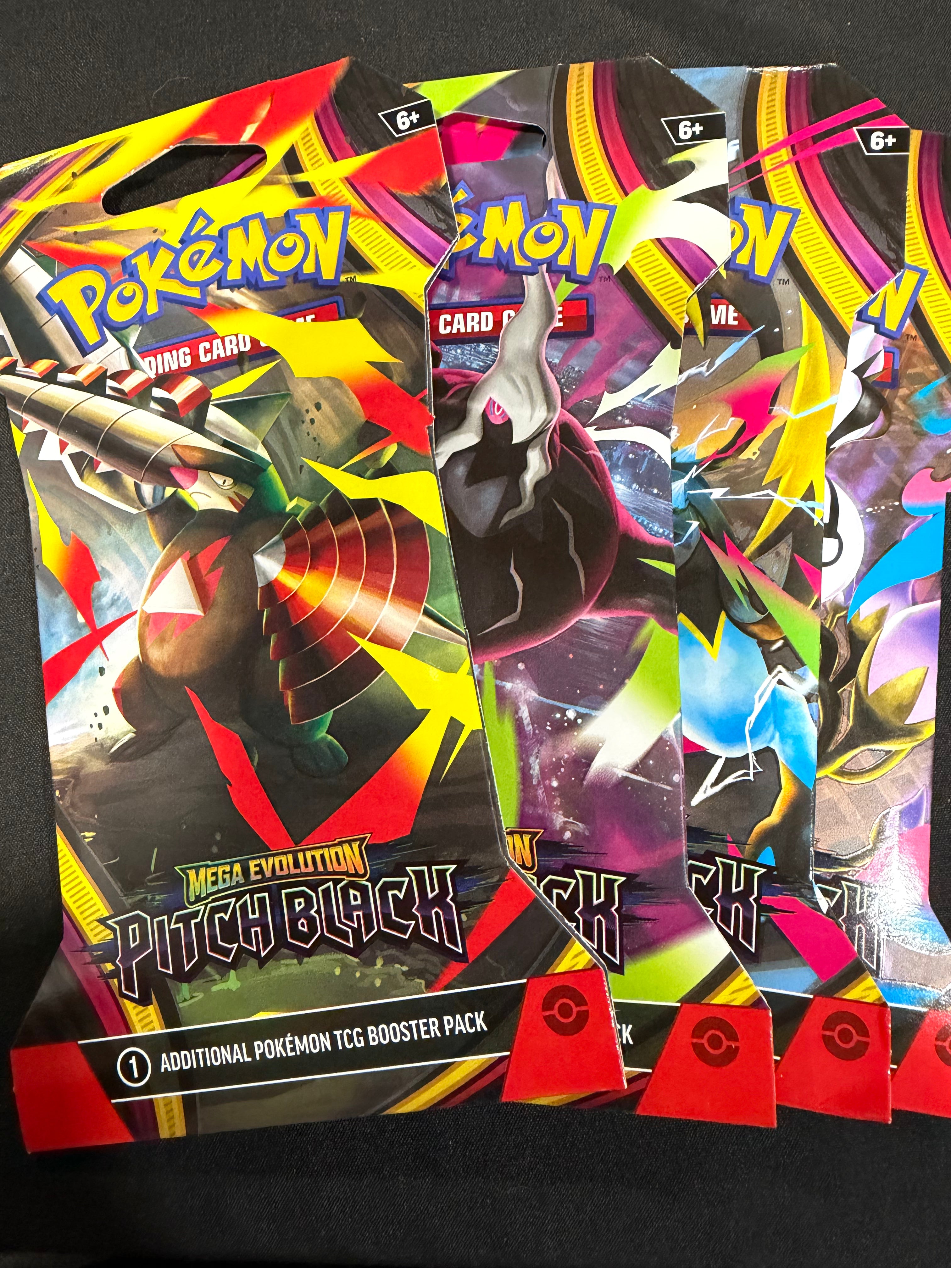 Pokémon TCG: Mega Evolution – Pitch Black Sleeved Booster Pack (Factory Sealed) Style May Vary